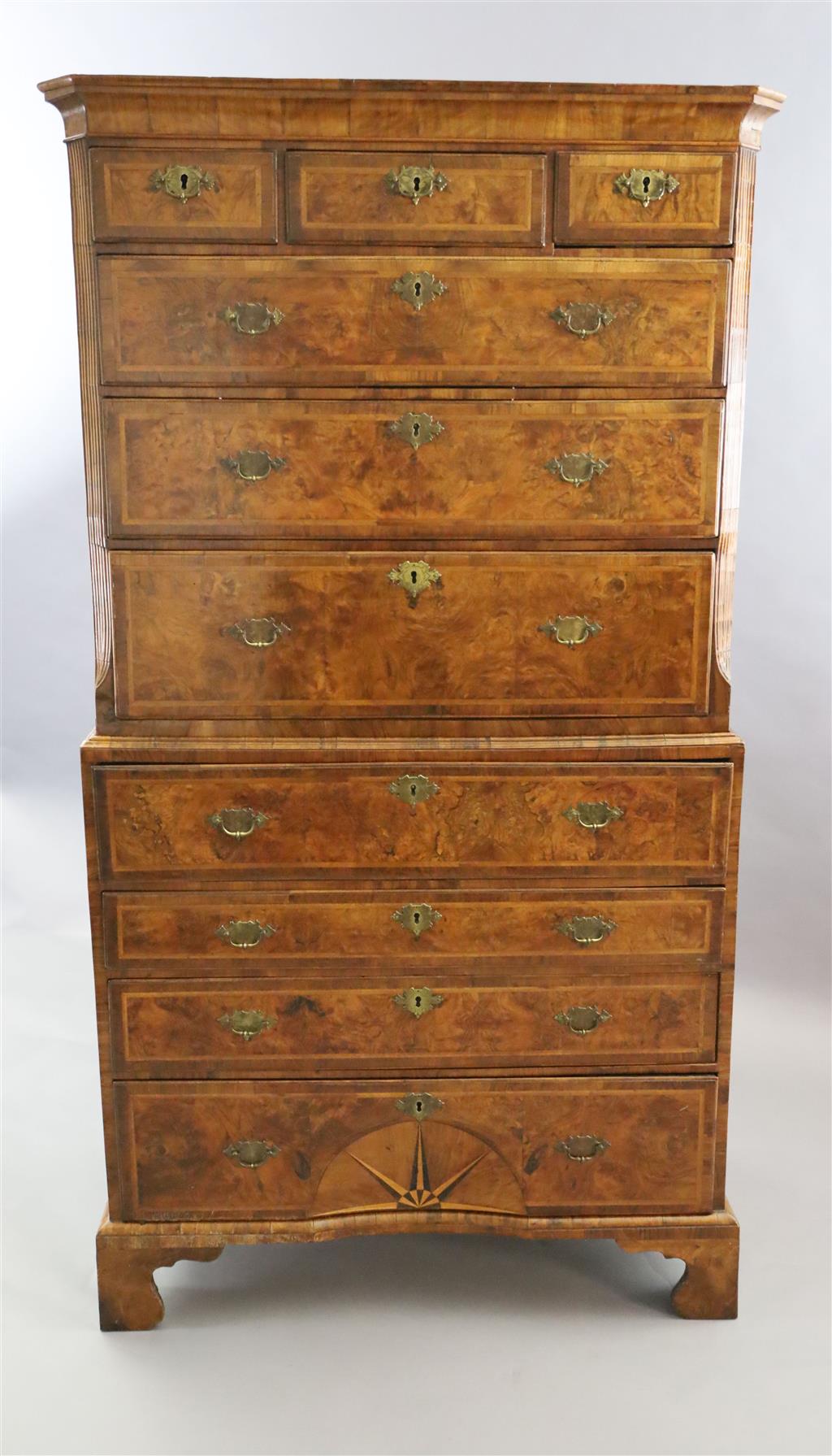 A George II figured walnut secretaire chest on chest, W.3ft 5.5in. D.1ft 10in. H.6ft 4in.
